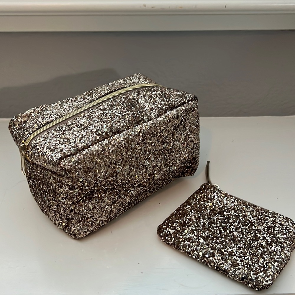 Sparkling gold makeup bag and matching pouch. Never used!